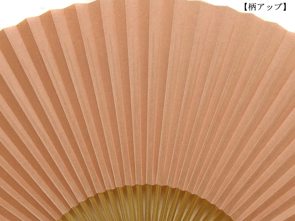 folding made with woven in a beautiful made in Japan in Handcrafted by with a traditional Japanese Features a Kyoto-style fan, paper, ibis-pink color.