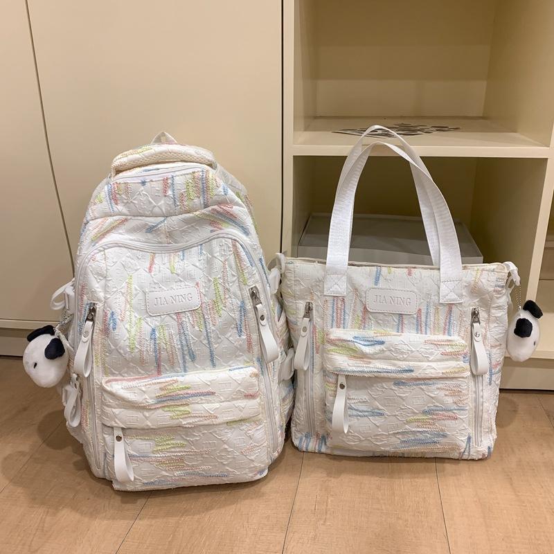New Large-capacity Backpack, Popular Burden-reducing Schoolbag for Junior High School and High School Students, College Student Women's Travel Bag.