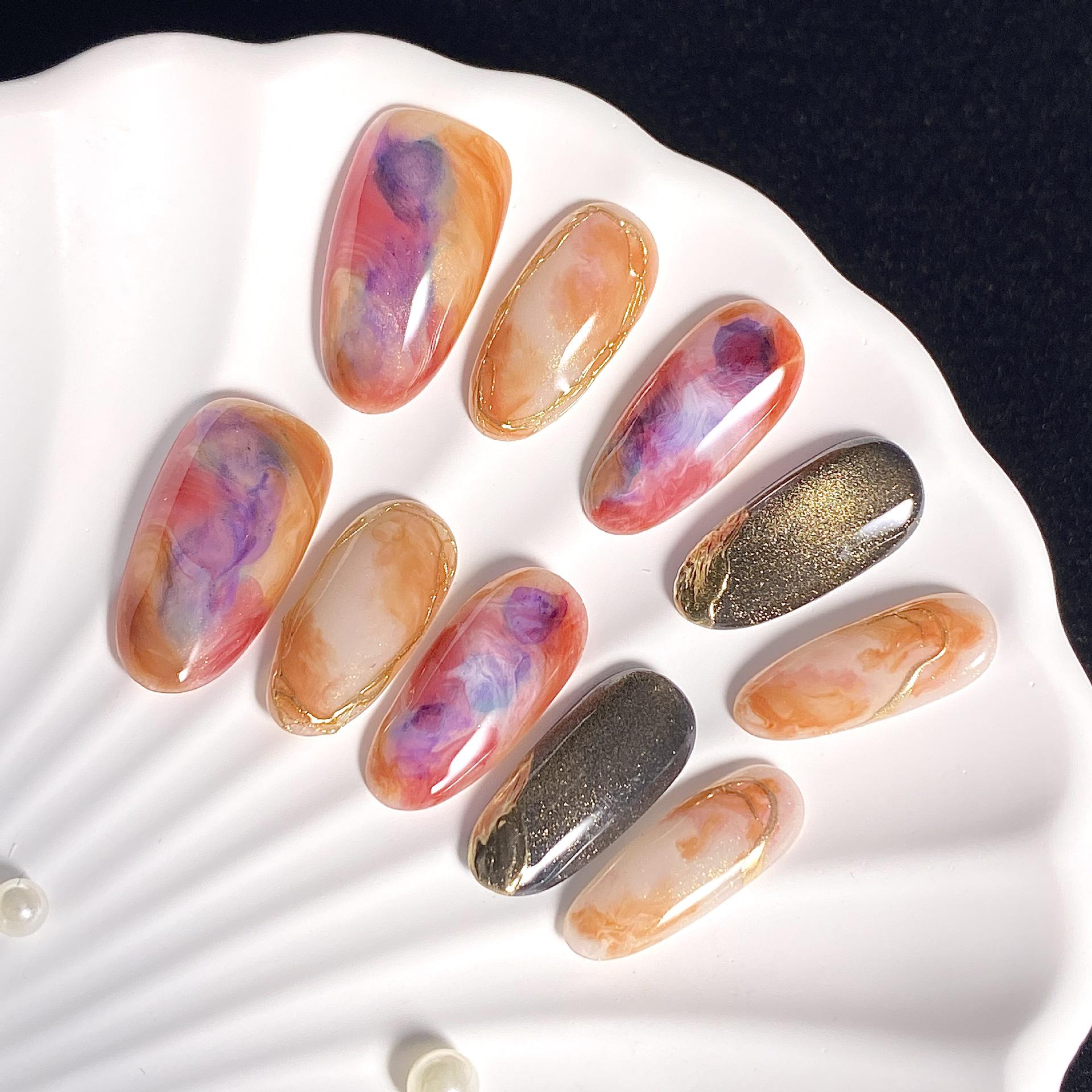 

Purple-Orange Gradient Press-On Nails: Smudged Oil Painting Style, Gold Line, Magic Mirror Powder, Medium-Length Oval Tips for a High-End Look. Large