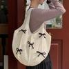 Vintage Design Damen Strick-Schultertasche Süße Schleife Damen Reise-Tote Handtaschen Große Kapazität Tragbare Damen-Einkaufstaschen