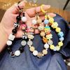 Hand-painted Beaded Cartoon Doll Mobile Phone Chain Mobile Phone Pendant Back Clip Blind Box Key Chain Pendant