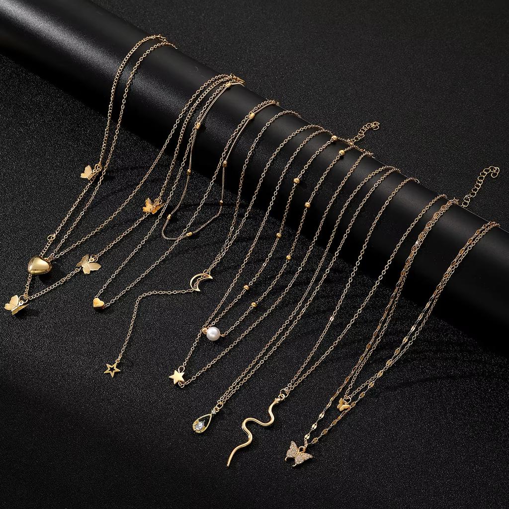 9 Pcs Multi-layered Gold Color Necklace Set for Women Fashion Zircon Heart Butterfly Star Moon Snake Pendant Necklaces Set