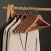 Anti-Slip Solid Wood Clothes Hanger - No Trace, Ideal for Home, Store, and Hotel Wardrobes