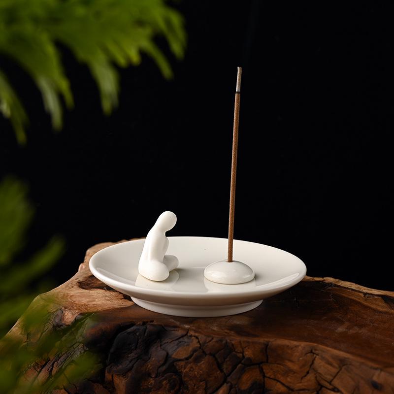 Zen-Style Formless Buddha Incense Holder: Simple White Porcelain Monk for Living Room or Study Decor.