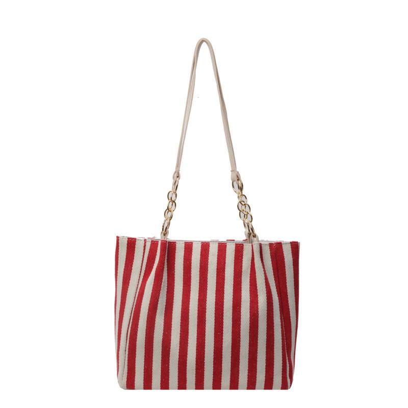 Стильная холщовая сумка-тоут в уличном стиле с шикарной строчкой и пэчворком красный