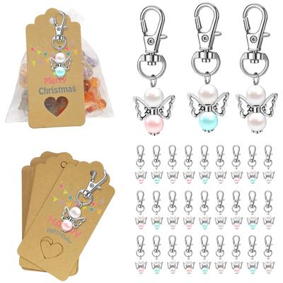 Packung mit 30 Schutzengel-Anhängern, Gastgeschenke, Taufe Hochzeit mit Organzabeutel und Anhänger aus Kraftpapier