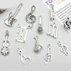 60 szt. Antyczne Srebrne Wisiorki Charms Nuty Instrumentów Muzycznych do Wyrobu Biżuterii Gitara Pianino Skrzypce Elementy DIY Rzemiosło