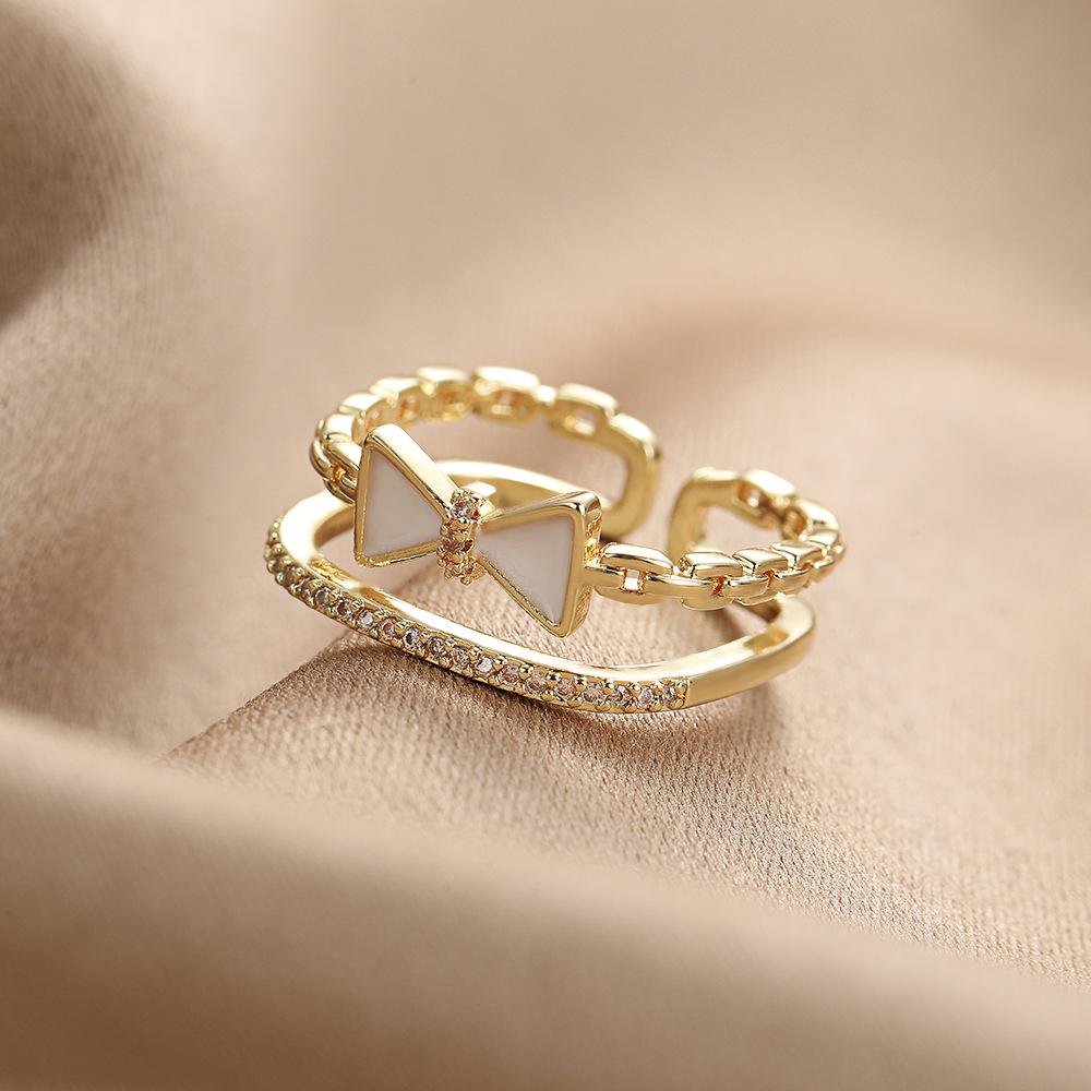 Korean style hollow out double-layer bow ring for women, light luxury, sweet personality, open index finger rings