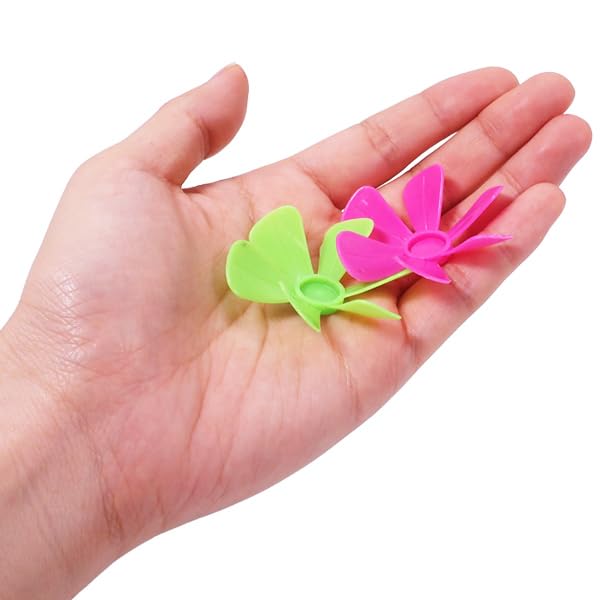 Spinning 2 Pieces Per Bag X 50 Pieces Per Total of 100 4 Colors Spins When You Blow On Them Tops, (2 Bag, Pieces), Assorted,