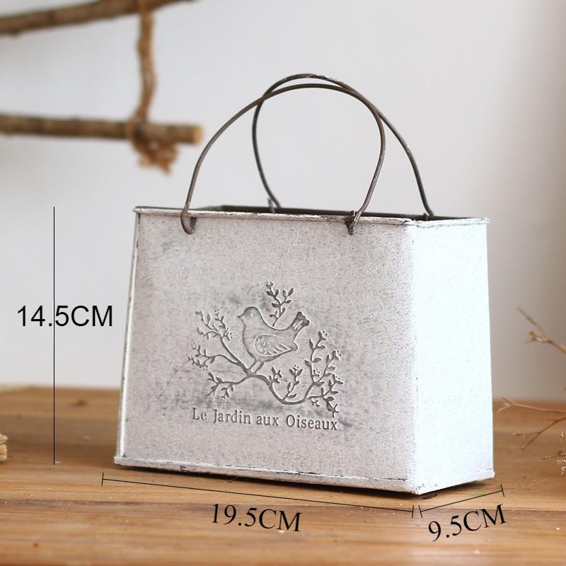 Kreative Handtaschen-Vase Retro Metallkunst Blumenkorb Elegante Pflanze Trockenblumen-Vase Heim-Schreibtisch Dekoration Schmuck Vasen