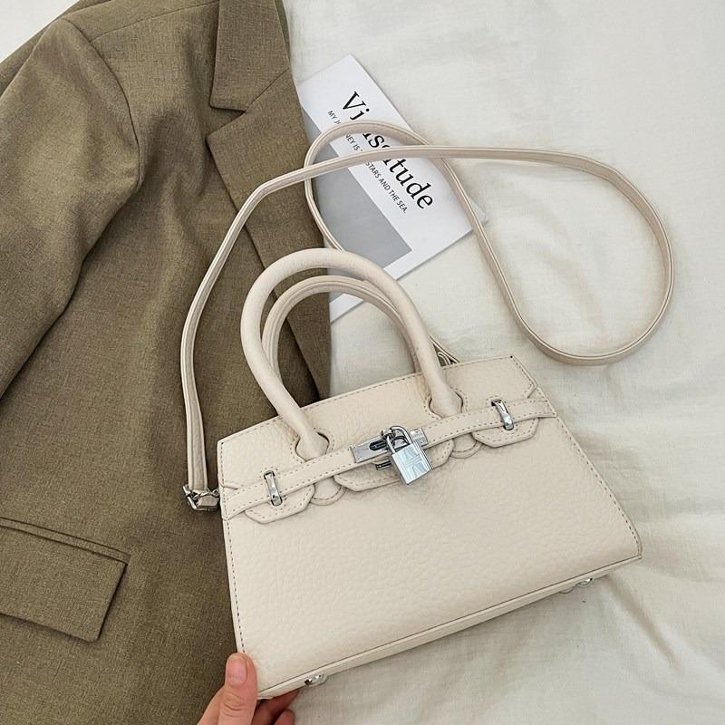 Bag women's new trendy high-end fashion niche design shoulder messenger bag portable platinum bag