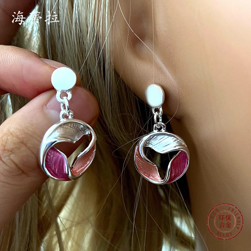 New rose red flower hollow alloy earrings, colored painting oil high-end women's petal studs