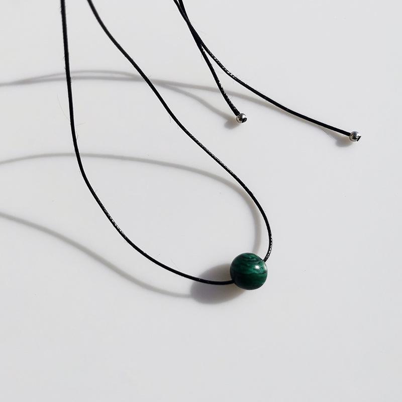 Unisex Retro Geometric Stone Pendant Necklace with Rotating Bead & Leather Cord – Versatile, High-End, Colorfast Design for Women & Men