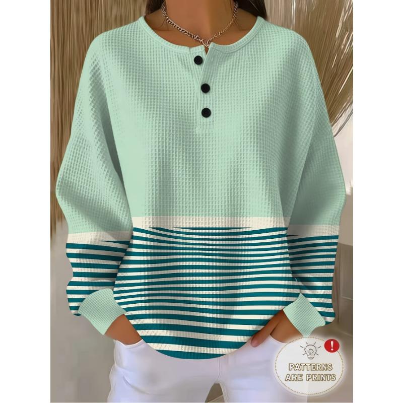 Women's Three-Button Henley Collar Waffle Long-Sleeve Top, Featuring a Contrasting Stripe Patchwork Design.