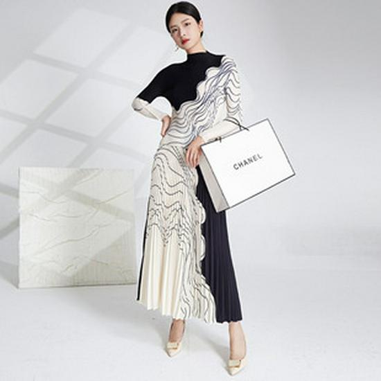 Pleated Skirt & Striped Long-Sleeve Top Two-Piece Set for Women - Spring Collection