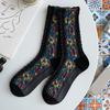 1 par middels lange, varme sokker til kvinner, med blomstermønster og etnisk trykk, crew socks for høst og vinter