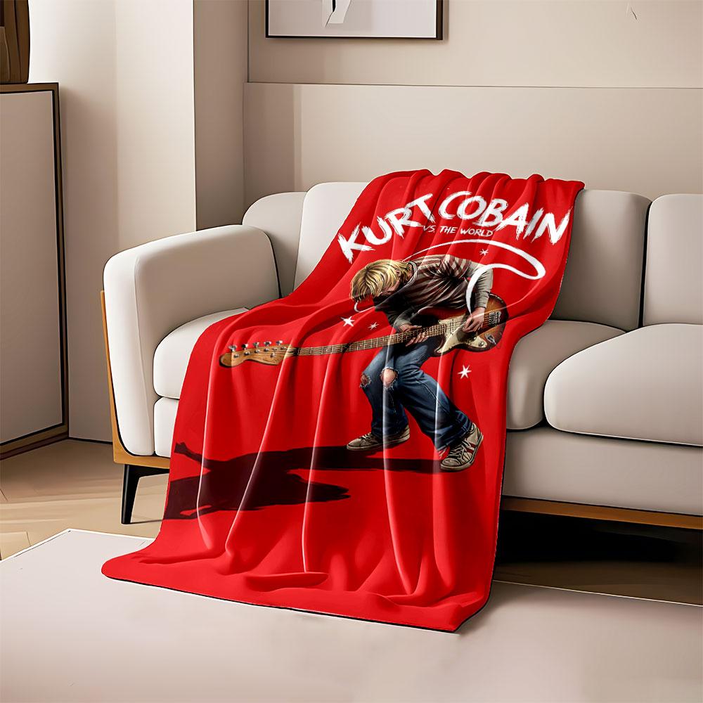

A guitarist with blonde hair on a red background, surrounded by text and stars. for all seasons blanket lunch break throw gift 80cm x 120cm