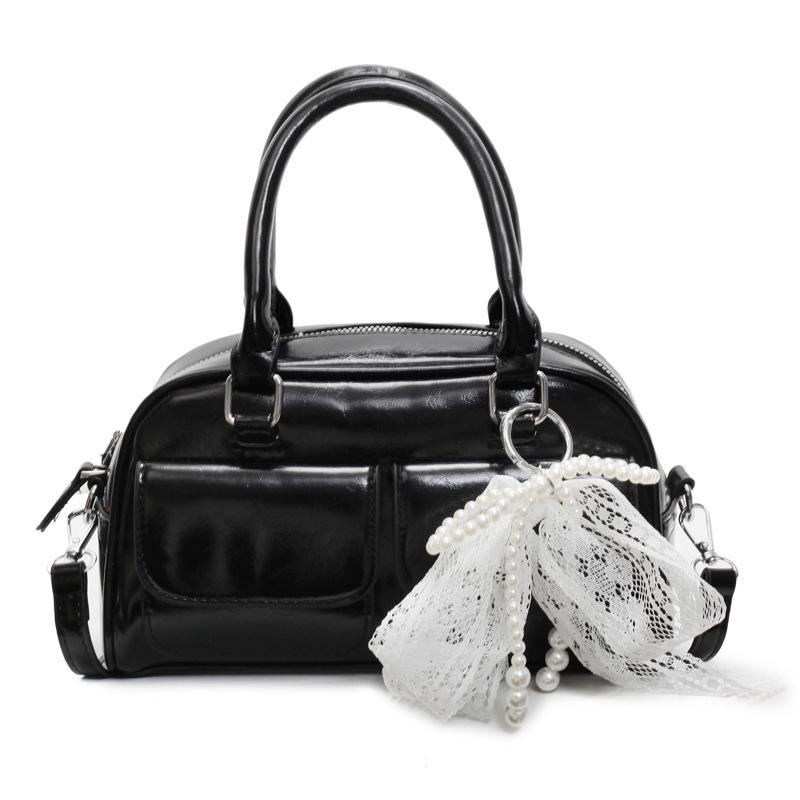 Korean version of the popular spring and summer dopamine simple portable Boston bag niche casual foreign style commuter messenger bag bag woman