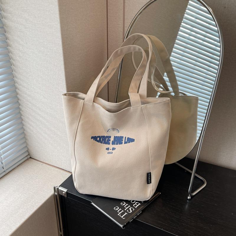 Niche Canvas Bag Women's Large-capacity New Casual Versatile Shoulder Bag Class Commuter Tote Bag