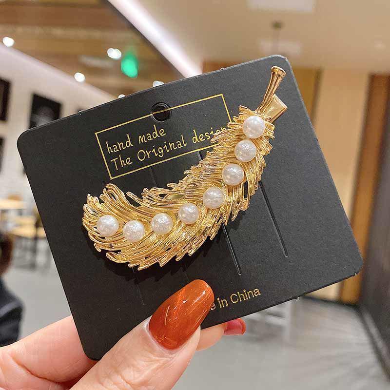 

Минималистичный набор заколок-перьев из сплава и жемчужных невидимок для женщин