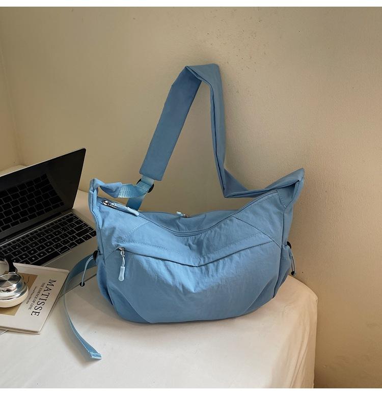 

2025 new trendy personalized shoulder bag women s daily simple dumpling bag versatile nylon messenger bag women s leisure синий
