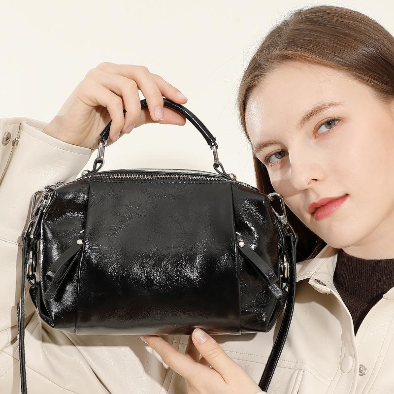 Spring and Summer European and American Boston Bag Genuine Leather Women's Bag Pillow Bag Handbag New Top Leather One Shoulder Cross Span Bag