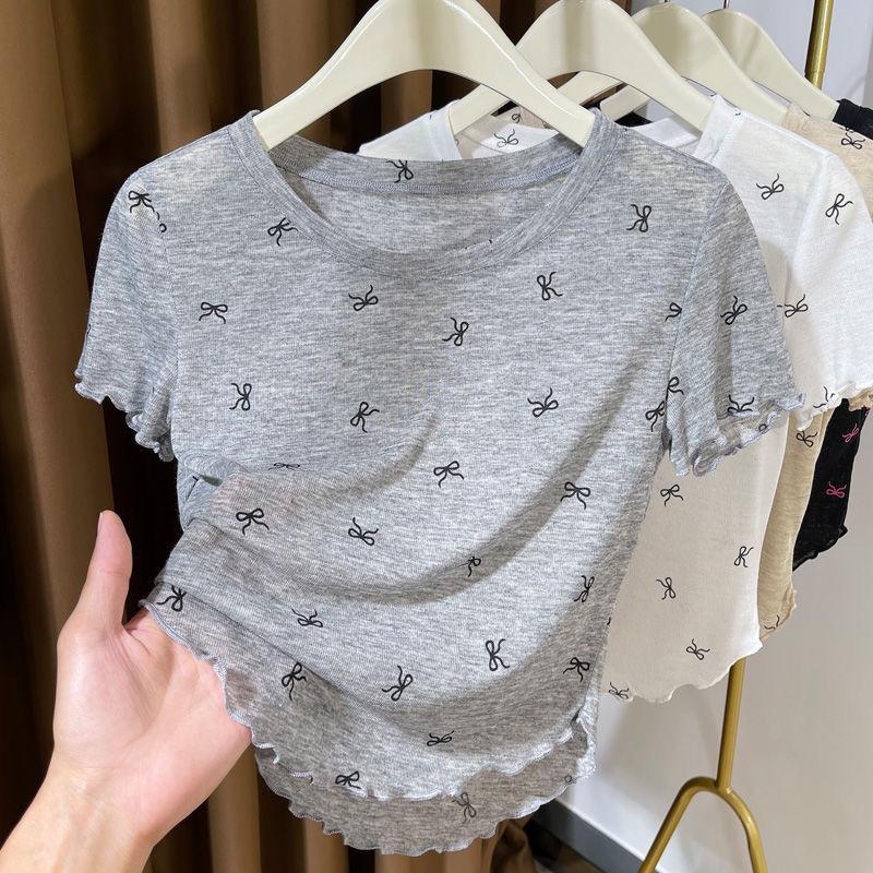 

Ультратонкая и полупрозрачная футболка с короткими рукавами и принтом в виде банта для женщин в сочетании с базовым слоем под ней XL серый