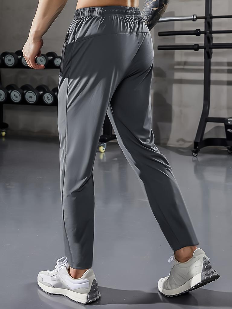 Herren Freizeit-Sporthose, Hochdehnbare Webware, Einfarbig, Normale Passform mit Kordelzugbund und Reißverschluss