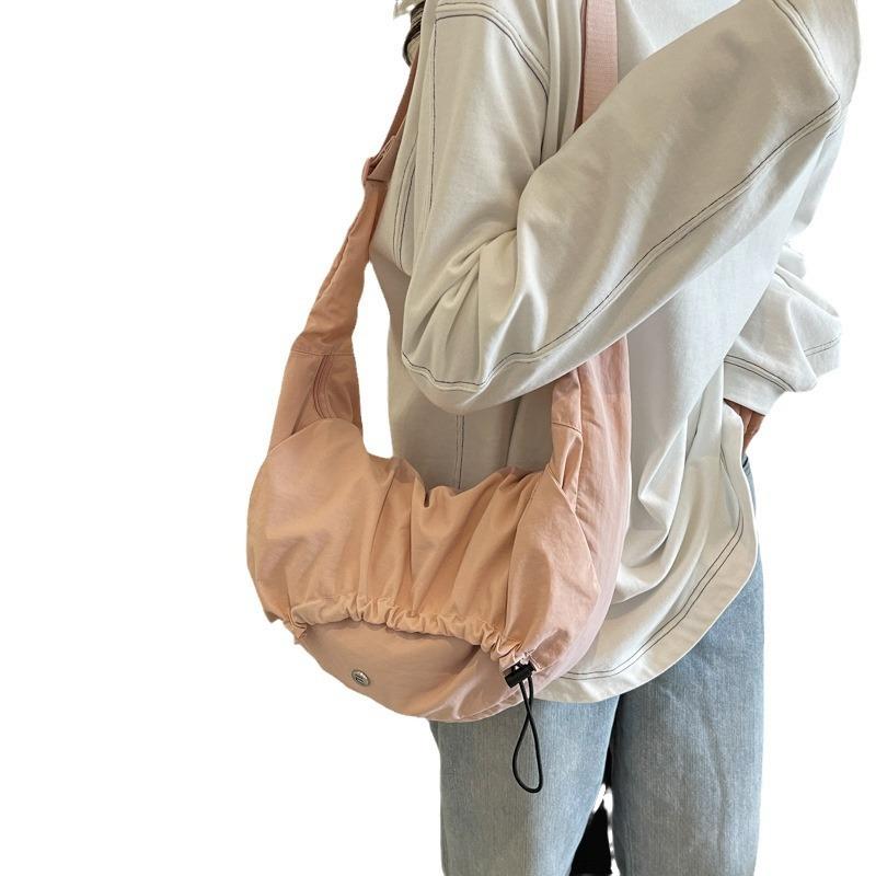 Spring new ultra-light fashion pleated messenger bag student cloth bag shoulder bag pull belt sewing line pleated bag