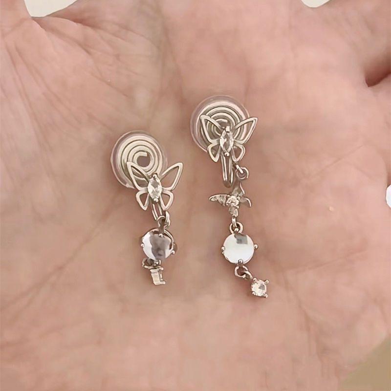 2026 new asymmetrical super fairy moonstone butterfly earrings women s niche design high-end stud earrings light luxury earclips