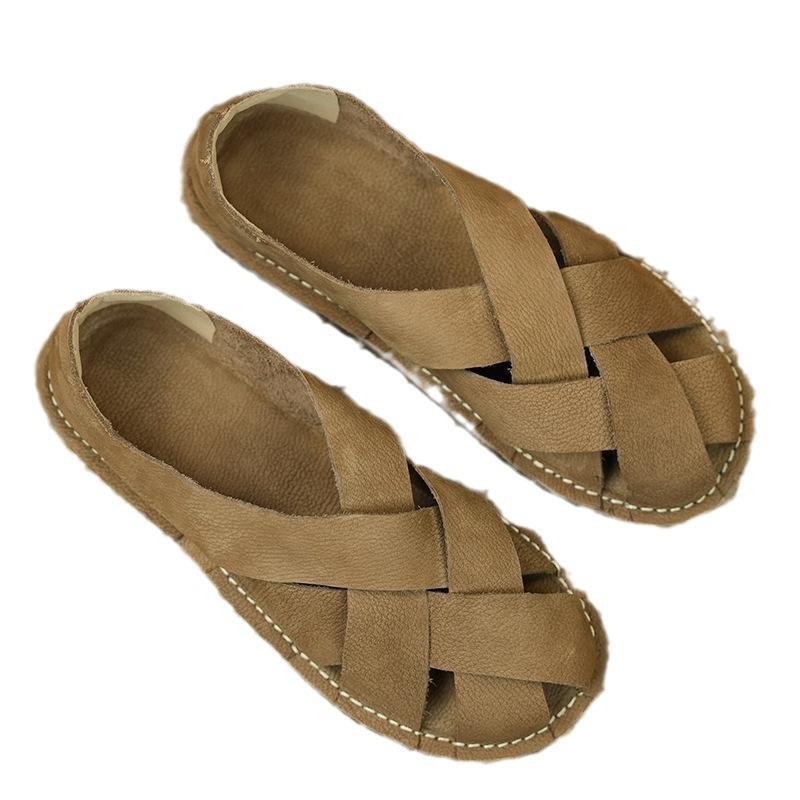 Baotou sandals women's summer 2025 new retro solid color hand-woven flat bottom round head casual Roman women's sandals