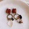 Vintage resin rhombus leaf fringed ear clips for women without earrings, niche earrings for women