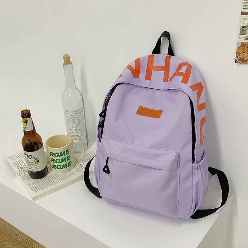 High value letter printing, junior high school students, primary school students, simple and versatile, ultra-light college style backpack