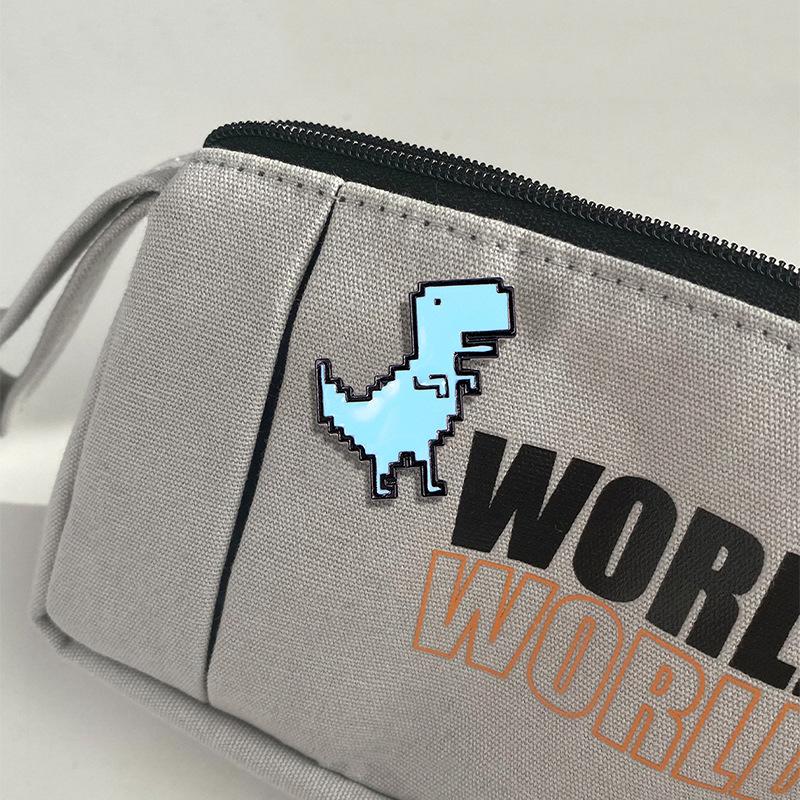 Cartoon Pixel Dinosaur Brooch: Trendy Metal Badge and Bag Accessory