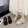 Women's muffin thick-soled heightening sandals women's summer wear high-end black French fairy high-heeled one-word slippers