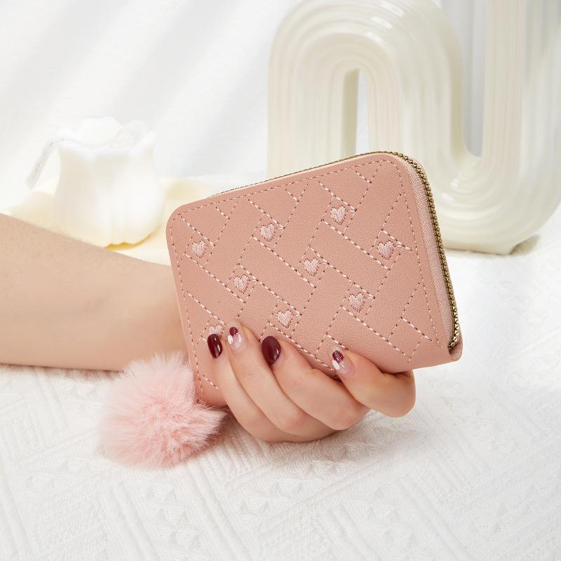 New single zipper multi-functional short women's change bag fashionable and simple hairball decorative wallet