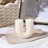 U-Shaped Geometric Striped Scented Candle for Modern Birthday and Home Decor Scene Layout