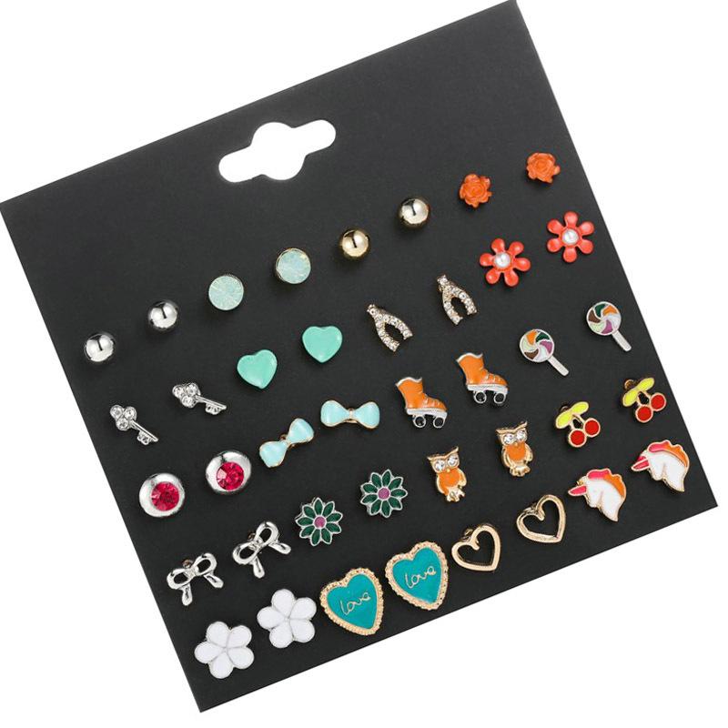 Korean version of versatile animal fruit combination set cute stud earrings female niche simple high-end rose flower earrings