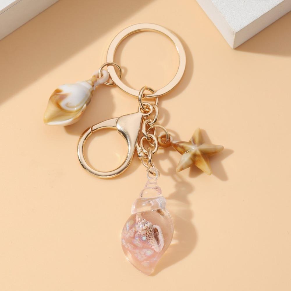 Bohemian Style Meeresstrand Anhänger Niedliche Seestern Muschel Schlüsselanhänger Leuchtende Muschel Schlüsselanhänger Urlaub