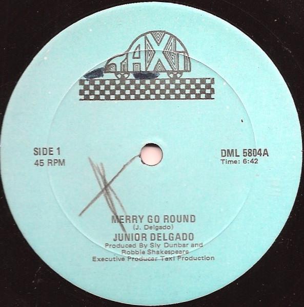 

12inch Record JUNIOR DELGADO Merry Go Round DML5804 Taxi Canada Reggae Ska Dub Used