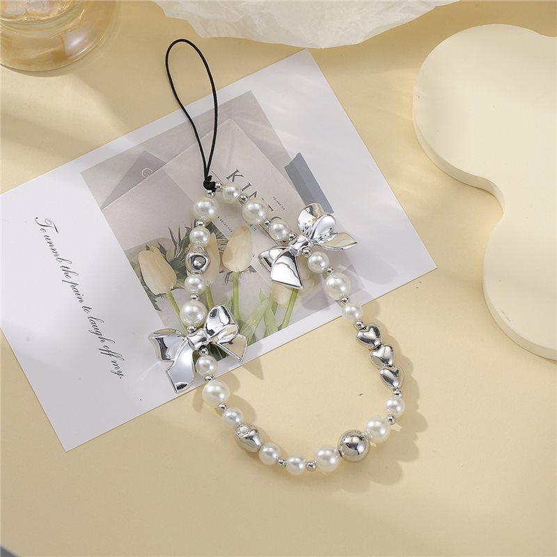 Elegant Pearl Bow Phone Lanyard for Women - Luxurious Beaded Wrist Strap, Fashionable and Versatile Anti-Lost Chain. Silver Bow Pearl Heart Lanyard