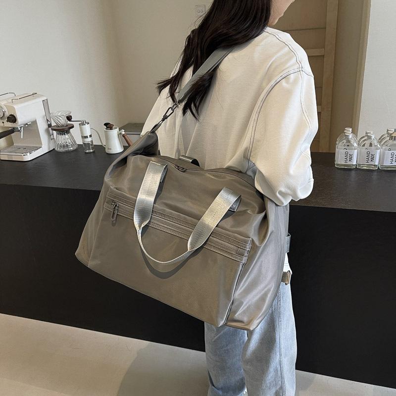 Simple Casual, Large Capacity Hand-held Travel Bag for Men and Women Students During School Holidays. Luggage Bag for Lever