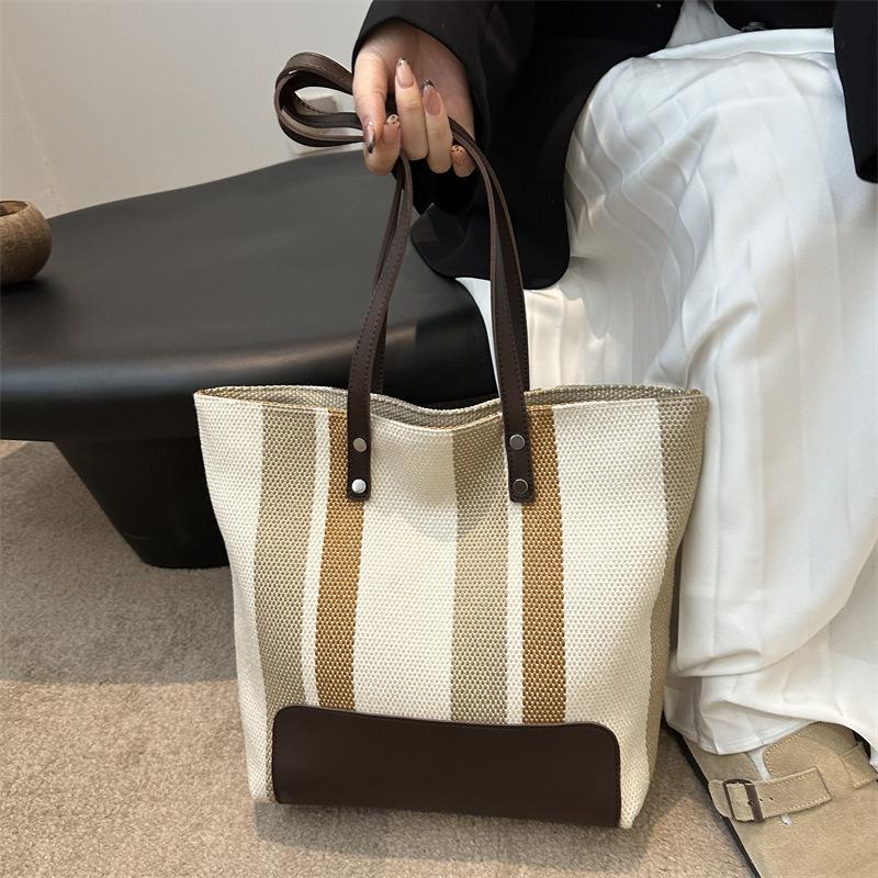 Simple Vertical Stripe Large-capacity Handbag Women's Korean Version New Casual Fashion Niche Versatile Lightweight Shoulder Bag