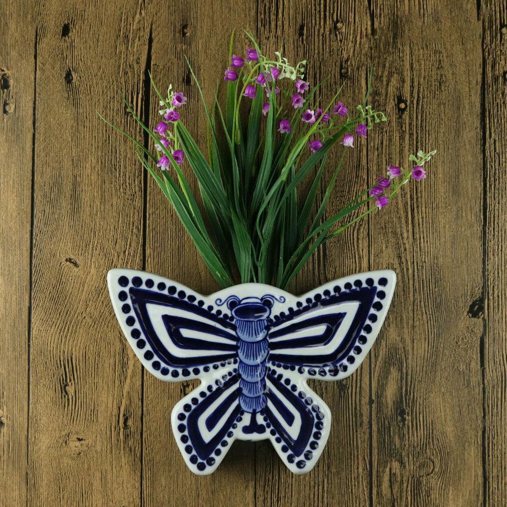 Hand-Painted Blue and White Ceramic Wall Vase with Floral and Bird Design