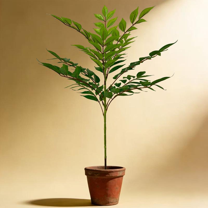 High-End Faux Potted Plant with Green Painted Wooden Leaves for Home and Courtyard Décor.