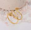 Bohemian Gold Spiral Coil Ring: Wide adjustable wire wrap ring with opposing scroll ends, perfect for a statement or toe ring.