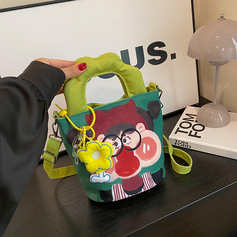 2025 Grenzüberschreitende Cartoon-Graffiti-Handtasche: Nischendesign Bucket Schulter- & Umhängetasche für Damen