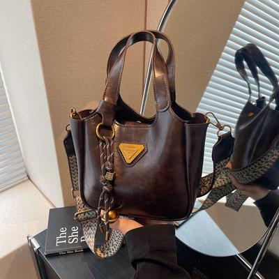 Retro tragbare Eimertasche Damen neue Herbst- und Winter-Umhängetasche Premium-Textur Nischen-Umhängetasche