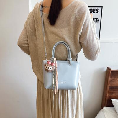 2025 nova bolsa pequena versátil de verão feminina bolsa de ombro transversal bolsa balde portátil com senso premium