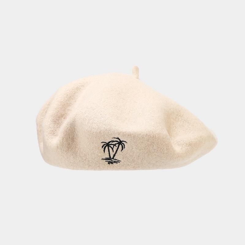 Cappello in lana da donna berretto retrò britannico con ricamo di cocco berretto alla moda viso piccolo moda semplice cappello da pittore all'ingrosso